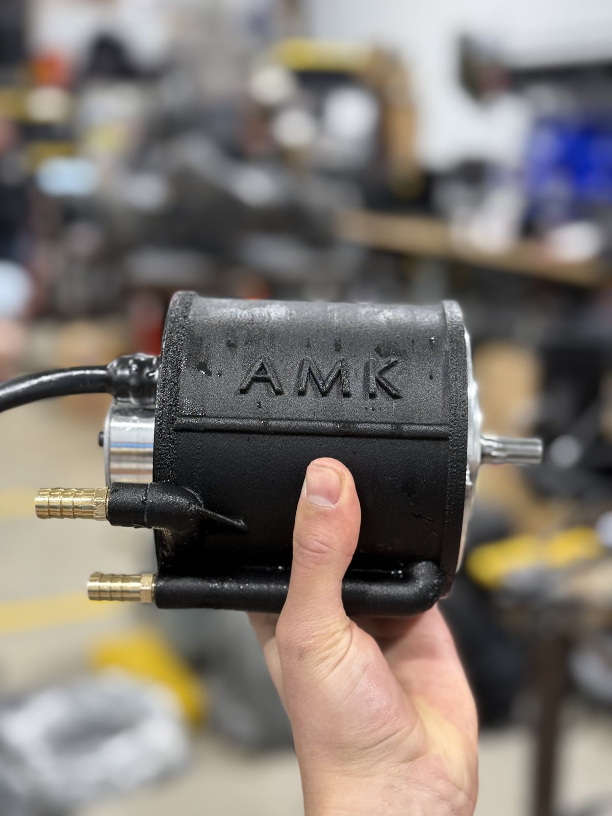 The finished cooling jacket mounted on an AMK hub motor